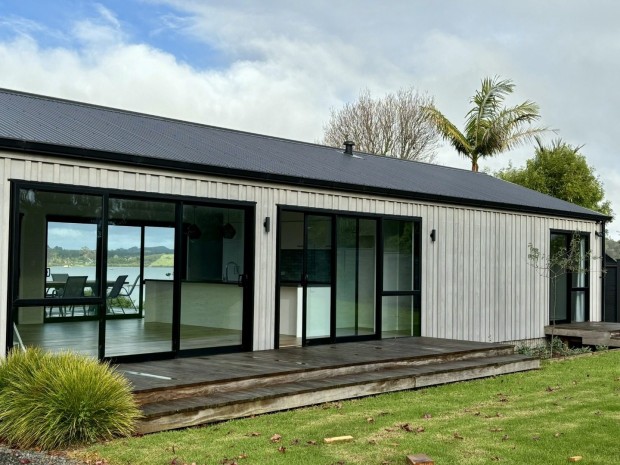 MODERN HOME WITH STUNNING INLET VIEWS