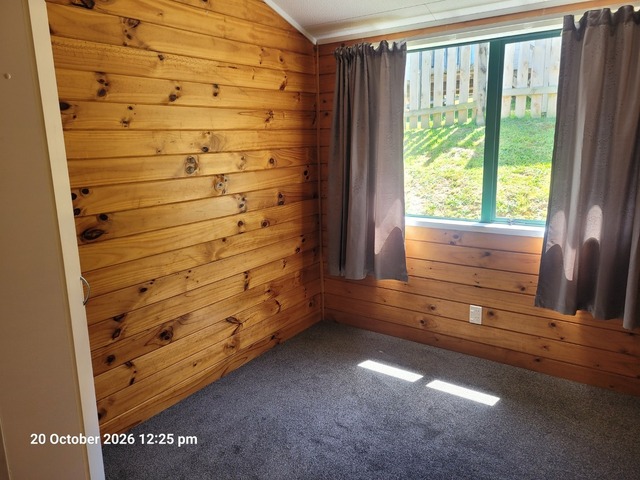 Tidy three bedroom house with a good single garage.